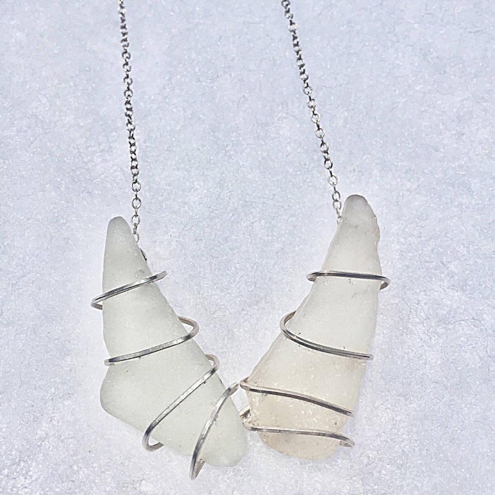 ‘Angel wings’ sterlg silver wire wrapped necklace
